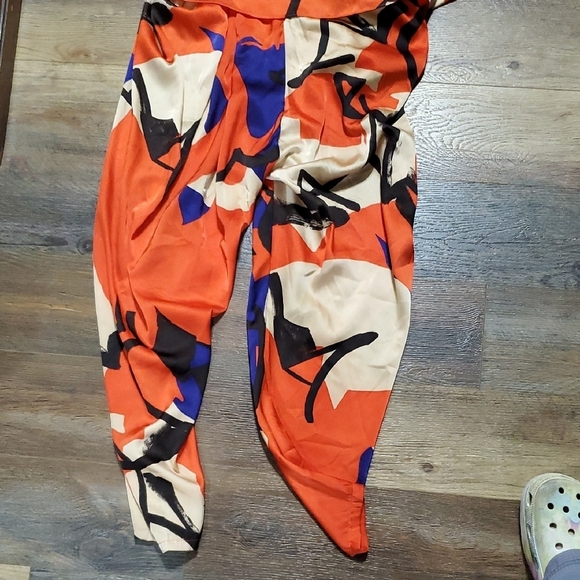 Vibrant Red and Blue Caped Jumpsuit with Abstract Print - Picture 6 of 8